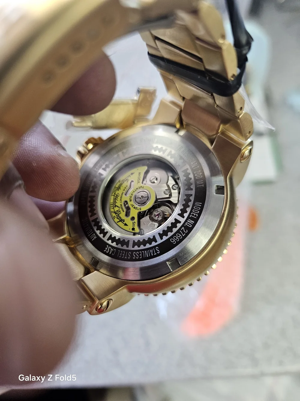 Invicta Gold Tone Divers Watch with Black Dial Turquoise Accents 52mm Automatic